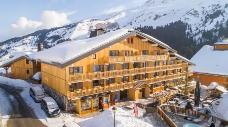 Madame Vacances Hôtel & Spa le Mottaret Отели рядом с достопримечательностью «Moncler»