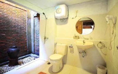 Rumah Lumbung Max Checkin 10Pm Ethnic Room at Omah Limasan by Omah Bungah Photo