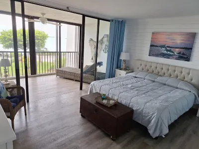 Gorgeous gem with breathtaking Sunsets & open water views at Rock Harbor Club Hotels near Dolphins Plus Marine Mammal Responder