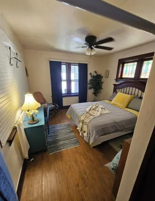 Charming 2-bedroom, cozy bungalow with sunroom in fabulous St. Louis with WiFi Hotels near CVS