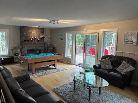 Ultimate Lakeview Cottage Retreat: Hot Tub, Paddle & Play