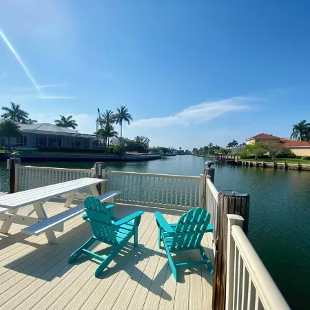 8 Minute Walk to Beach Luxury 4 Bdrm Waterfront home -salt water heated Pool