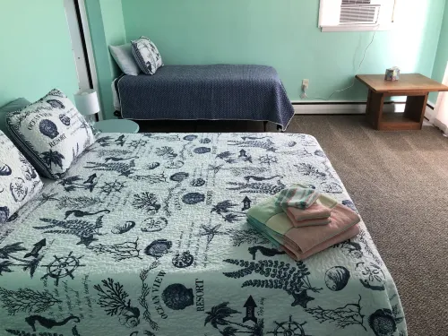 Beach Front on the Bay in Our Rustic, Pet Friendly Cottage 4 Bedroom Cottage by RedAwning - balcony
