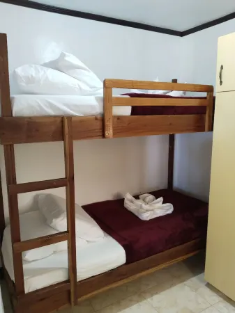 UNIT 1-Ground Floor-Holds 4pax Fully furnished kitchen, hot & cold showers.