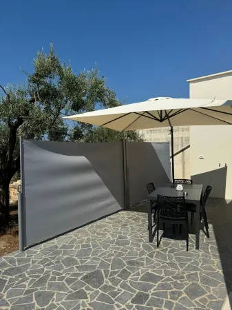 Charming 2-bedroom house in pleasant Torre San Giovanni with AC Отели в г. Torre San Giovanni Ugento