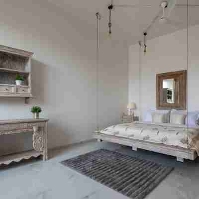ELIVAAS 3BHK White House Villa with View Rooms