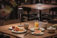 Home Hotel Folketeateret - servizio colazione