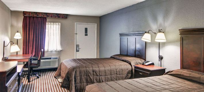 Loyalty Inn Gainesville Отели в г. Кук