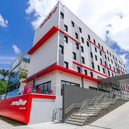 Hotel Moov Curitiba Отели рядом с достопримечательностью «Батл»