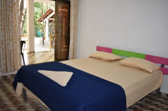 Coconut Garden Beach House Отели рядом с достопримечательностью «Девбаг Бич»