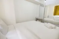 Simply Living 2Br at Bassura City Apartment by Travelio