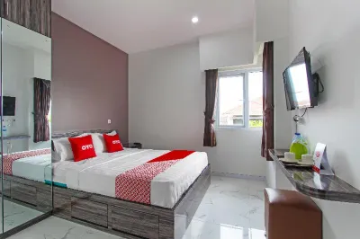 Super OYO Capital O 91665 d'Prof Exclusive Guesthouse Hotels near AYANNA CELL
