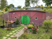 Hobbit Inspired Luxury Cabin Hot Tub Firepit Luxury Pet Friendly Sauna Hammock Hotels in Swan Township