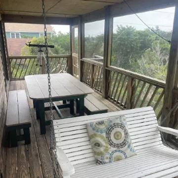 Three-bedroom house with views, decks, golf cart and home gym!