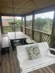 Three-bedroom house with views, decks, golf cart and home gym!