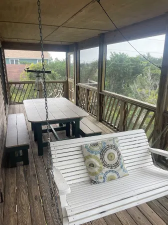 Three-bedroom house with views, decks, golf cart and home gym!