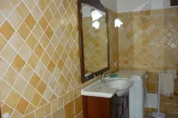 Nice two-room apartment with large garden with green lawn and vegetation