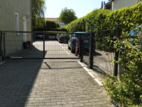 Vacation Apartment with Sunny Roof Terrace and Private Parking Space