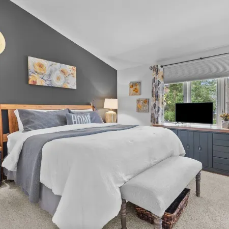 Winter Getaway with Cozy Fireplace in This Elegant Lake Geneva Condo & King Bed.