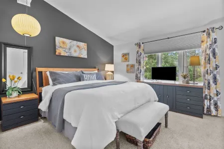 Winter Getaway with Cozy Fireplace in This Elegant Lake Geneva Condo & King Bed.