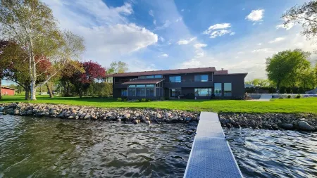 Paradise Found! Beautiful Lake Home with Private Heated Pool on Cannon Lake!