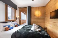 110m² apartment,  full services, 4 bedrooms, 3 bathrooms / d, south balcony and 2 parking spaces Hotels in Montvalezan