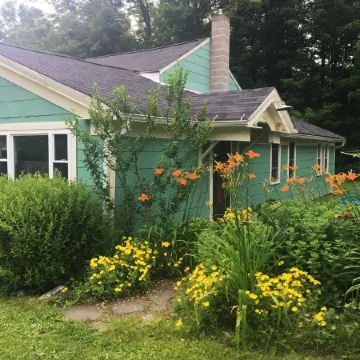 Farmhouse Gem with Gardens, Waterfalls and Orchards
