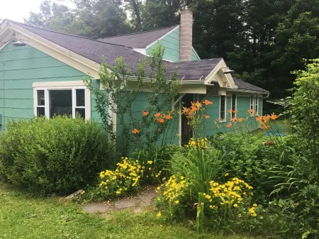 Farmhouse Gem with Gardens, Waterfalls and Orchards