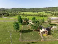 Historic Early Settler Farm House that Has Been Modernized For Your Comfort.