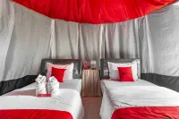 RedDoorz @ Apache Camp Hotels in Wonosalam