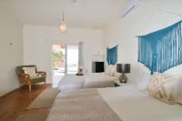 Arena y Mar Beachfront House, El Cuyo by the Spot Rentals