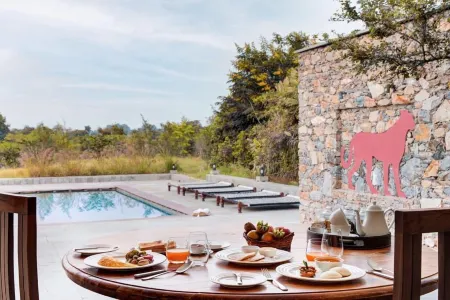 Bijapur Lodge Отели рядом с достопримечательностью «Riva Stays & Trails»