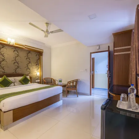 Treebo Akshaya Lalbagh Inn Отели рядом с достопримечательностью «Торговый квартал Ганди-Базар»