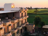 New Memnon Hotel Các khách sạn ở Al Bairat