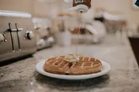 Phoenix Inn Suites Albany - petit déjeuner