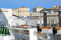 CinqueSuites Ortigia - sarapan