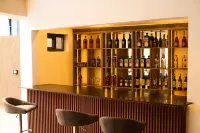 Aiden Homes and Apartments - bar