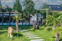 Villa Tropicana Berlin Potsdam Отели рядом с достопримечательностью «Pflanzen Discount»