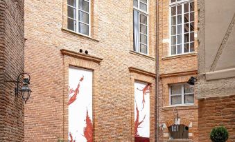 Les Relais du Capitole - Appartements d'hôtes