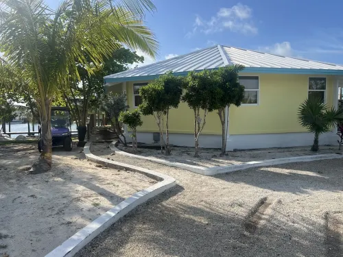 Big Yellow House with Dock on Deep Water Canal and Dock Power Available Hotels in Great Abaco