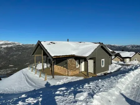 Vacation home Trollebo - unobstructed view - mountain panorama - ski slope - hiking Отели в г. Kviteseid