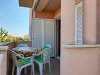 Apartment Tihana with 2 bedrooms and garden view, family-friendly