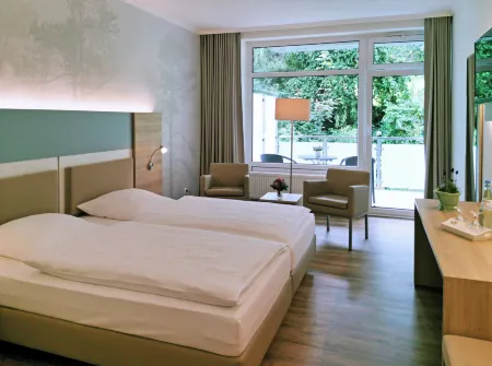 Waldhotel Felsenkeller Отели в г. Диссен-ам-Тойтобургер-Вальд