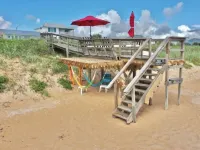Romantic Couples Beach Getaway ,with private beach, hammocks and umbrellas Hotels in Flagler Beach
