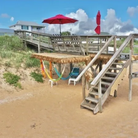 Romantic Couples Beach Getaway ,with private beach, hammocks and umbrellas