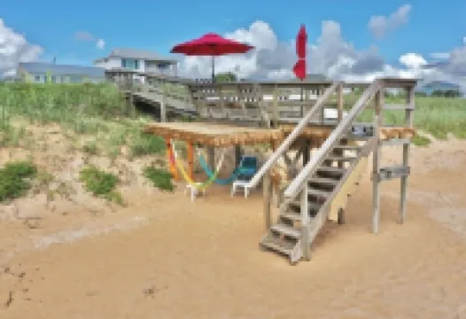 Romantic Couples Beach Getaway ,with private beach, hammocks and umbrellas