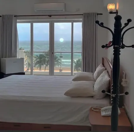 Enjoy a beautiful sunset from your ocean-view bedroom.