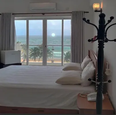 Enjoy a beautiful sunset from your ocean-view bedroom.