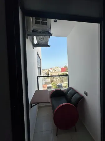 Charming 1-bedroom apartment few steps from Mehdya Beach Отели в г. Кенитра