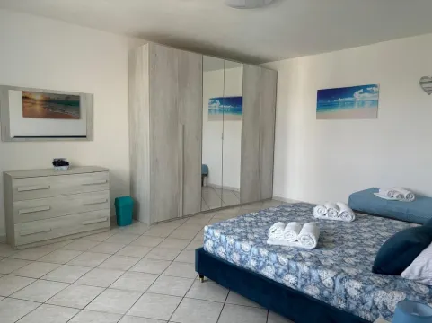 Villa surrounded by greenery nestled on the hillside